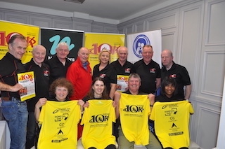 ./Nakita_Burke_the_2025_female_winner_Nikita_Burke_who_formally_launched_the_new_yellow_North_West_10k_t-shirt_on_Tuesday_night_with_committee_members_1778096931955